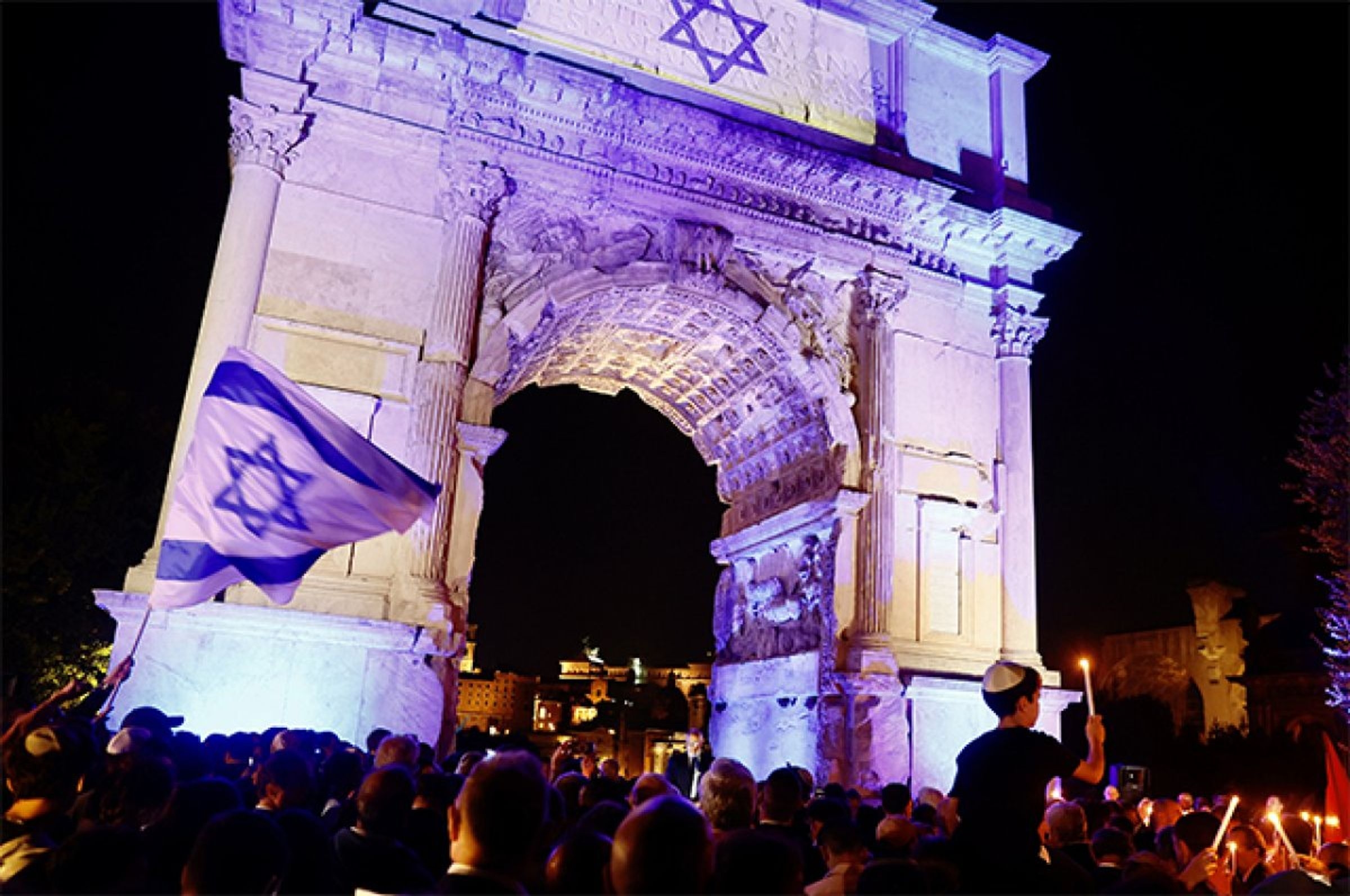 The Arch of Titus in Rome adorned with the colors of the Israeli flag