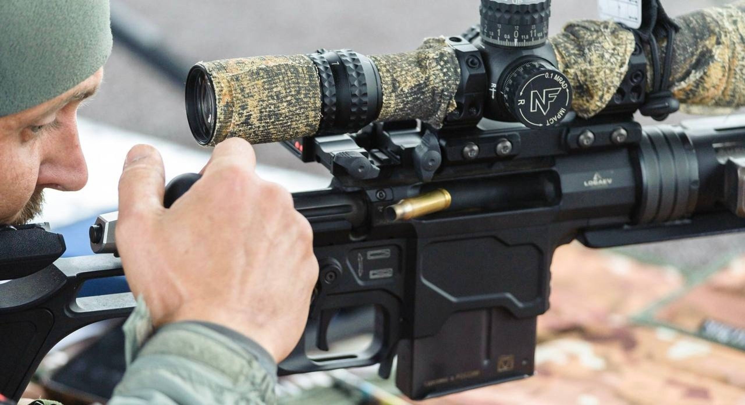 Participant in a sniper competition with a Lobaev Arms rifle and an American Nightforce scope