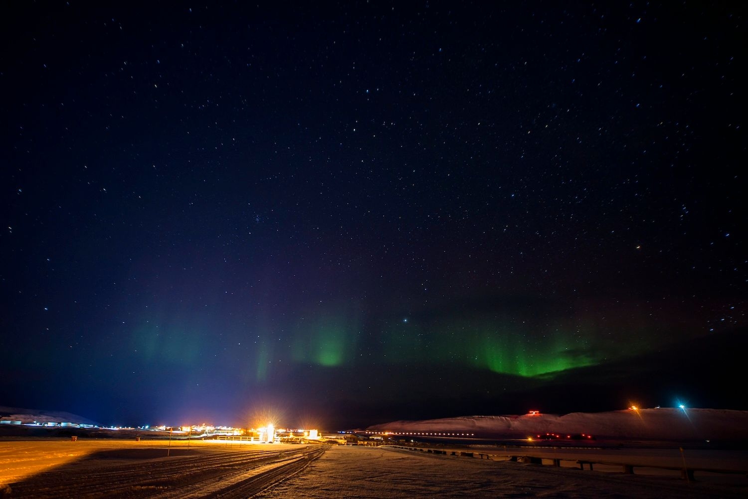 Northern lights over the US military's Pitufik Space Base in Greenland