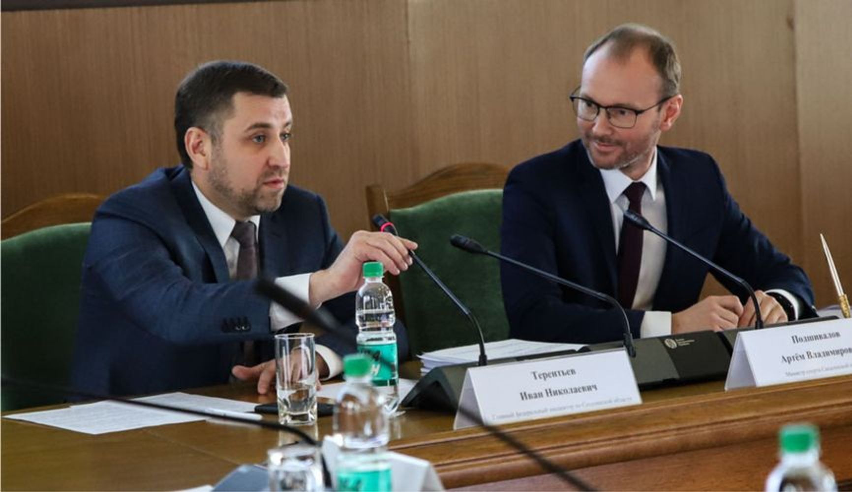 Terentiev, left, speaks at a public event in Yuzhno-Sakhalinsk in 2022. Official event photo.