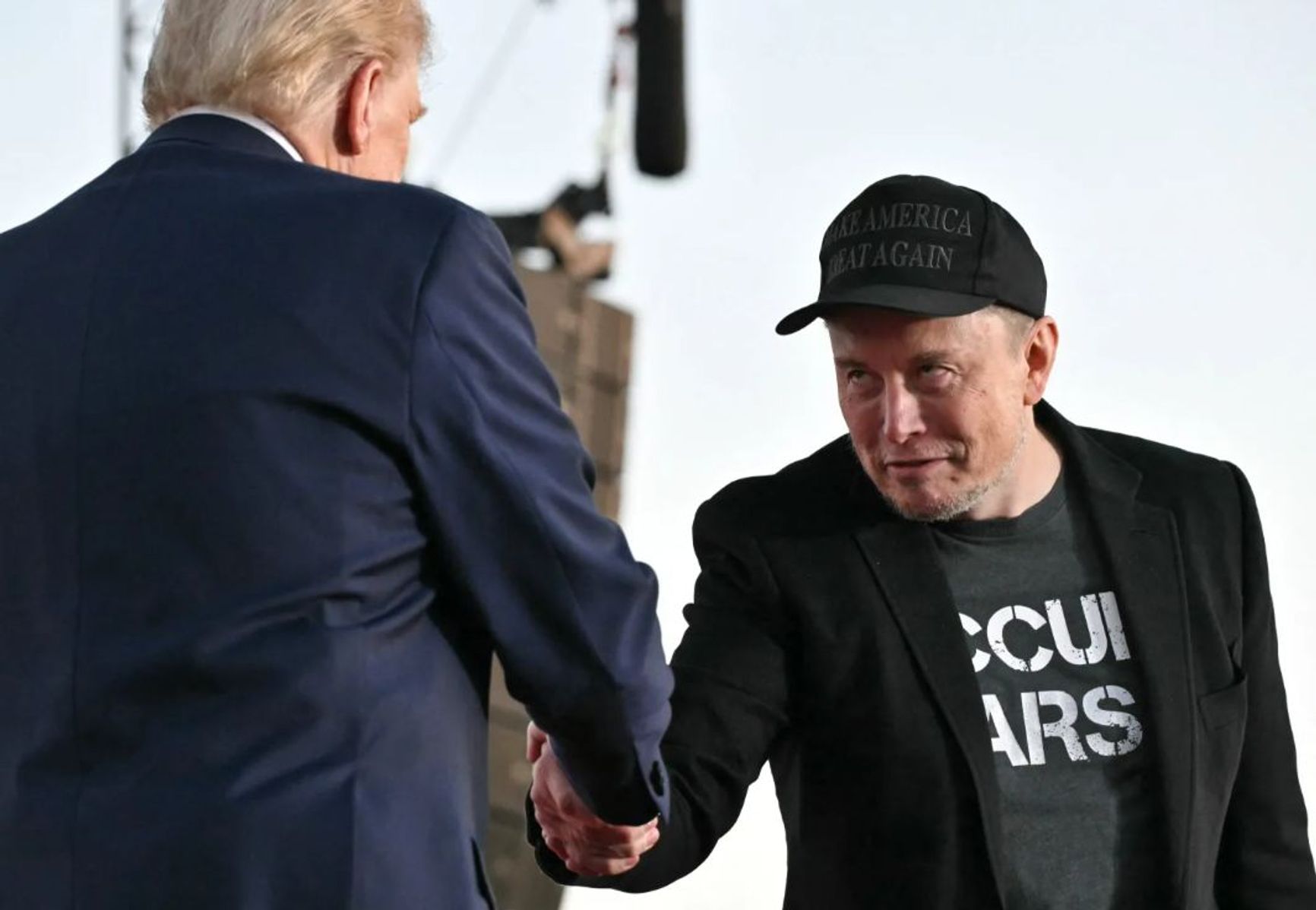 Donald Trump and Elon Musk during a campaign rally at site of Trump's first assassination attempt in Butler, Pennsylvania, Oct. 5, 2024.