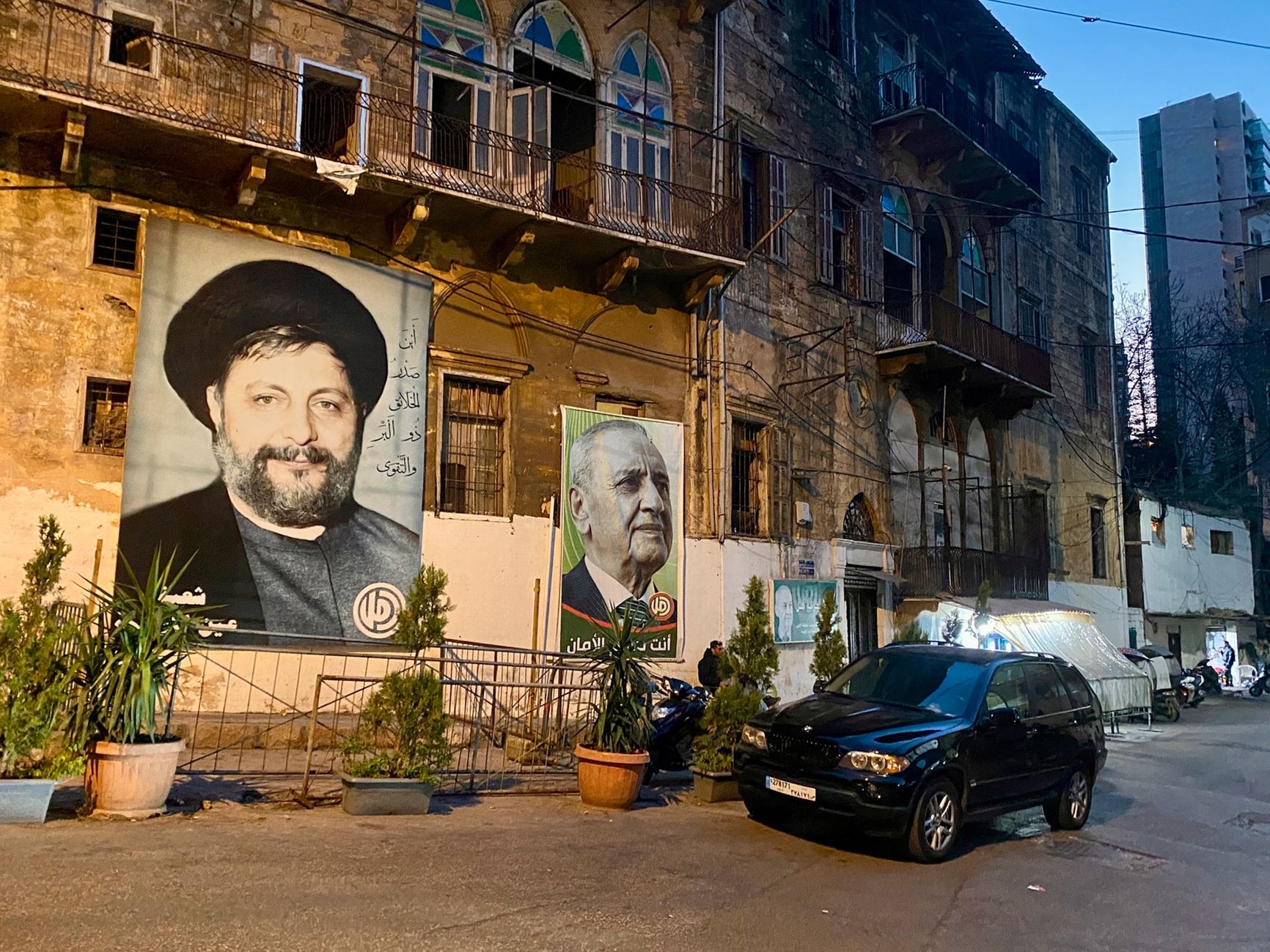 Portraits of Musa al-Sadr (left) and Nabih Berri (right) in Beirut