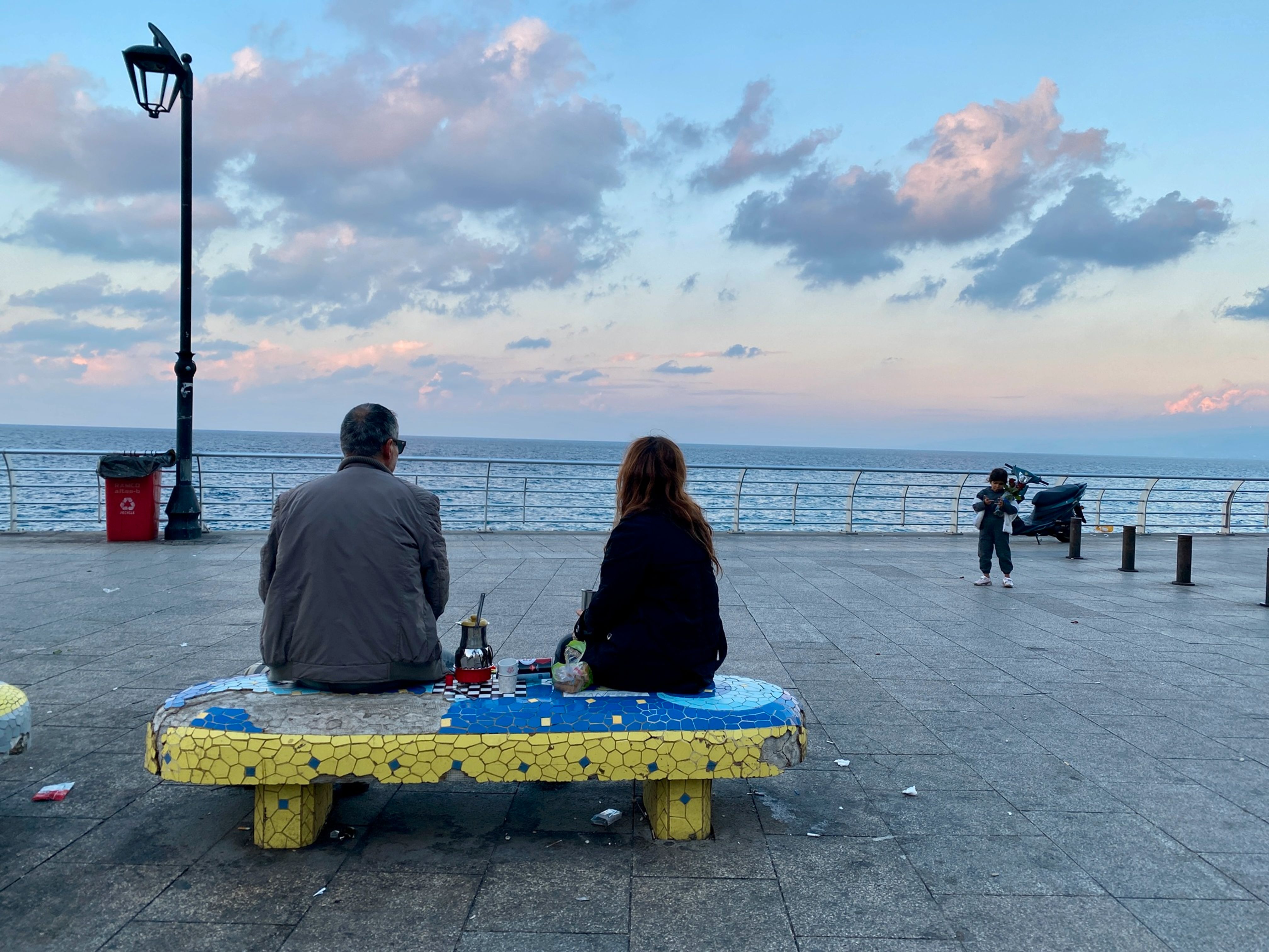 A couple on a seaside picnic in the center of Beirut
