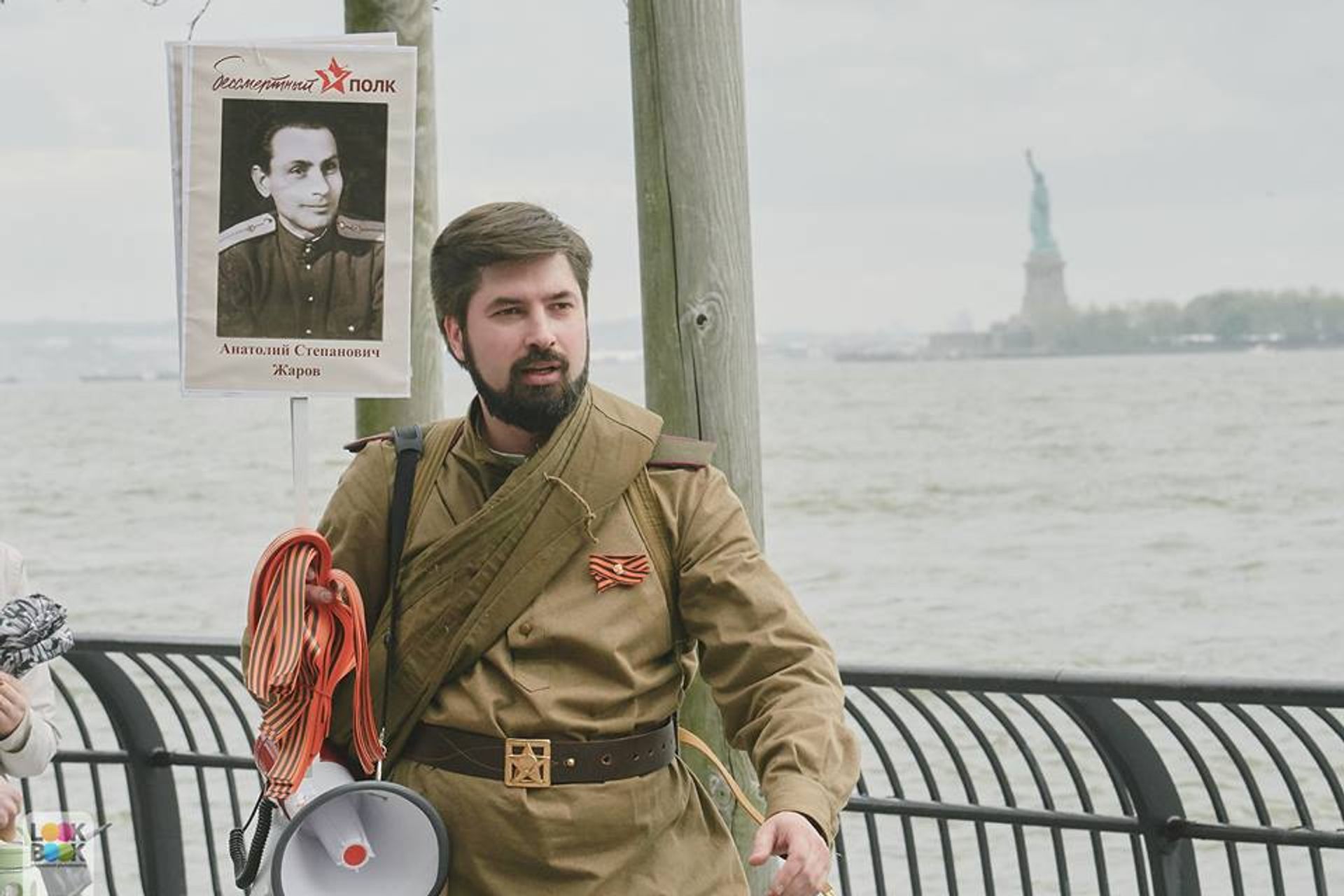 Igor Kochan with the Statue of Liberty in background